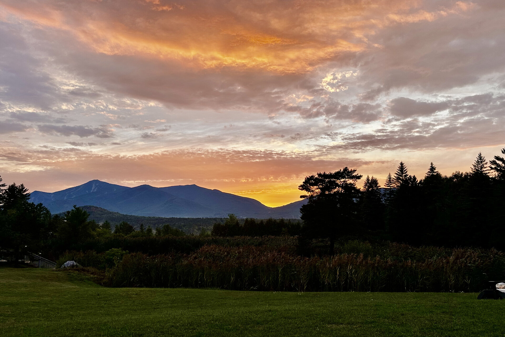 Whiteface Mountain at sunset over an Adirondack meadow